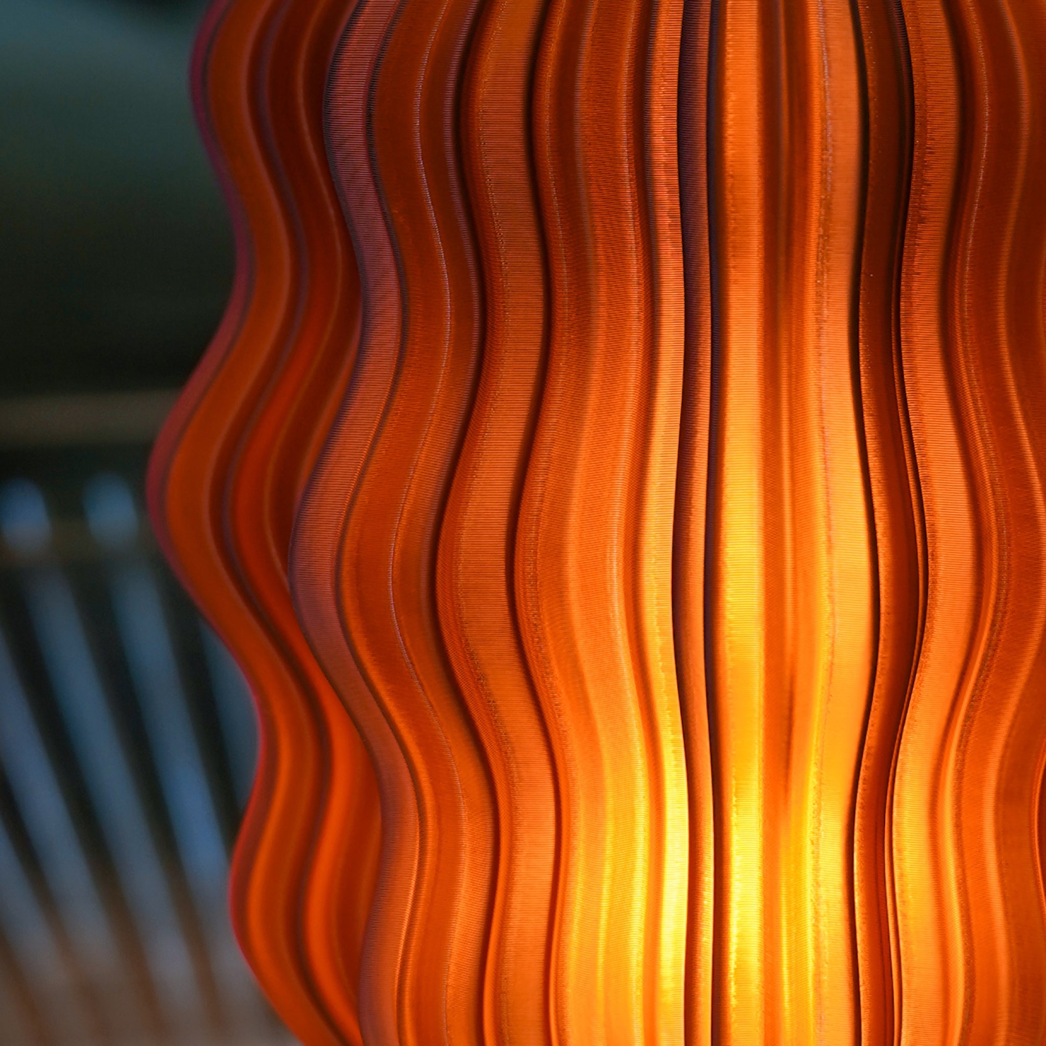 Close-up of a wavy wooden surface with warm tones.