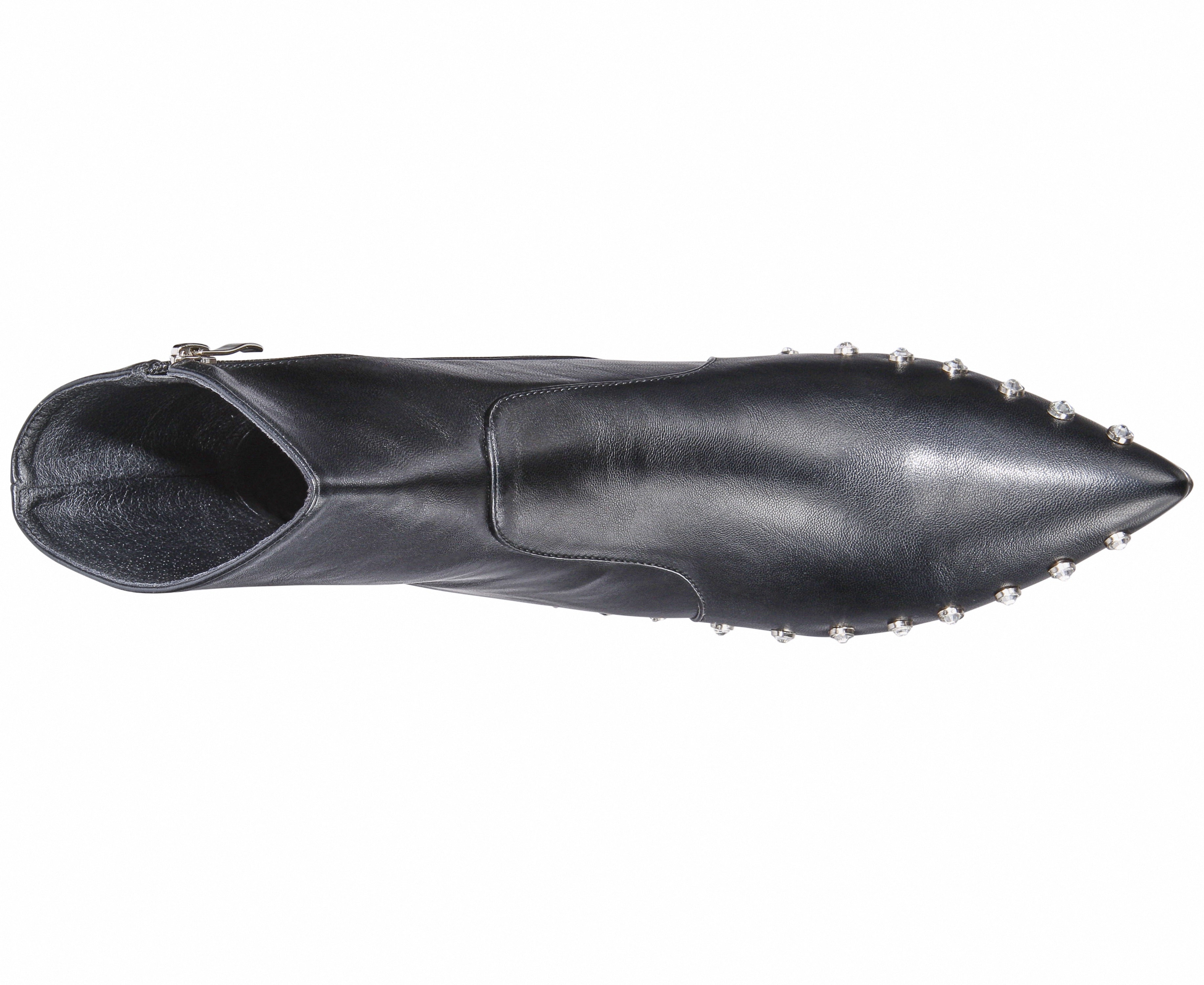 Black leather boot with studded details on a white background
