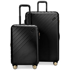 Two black suitcases with a geometric pattern on a white background