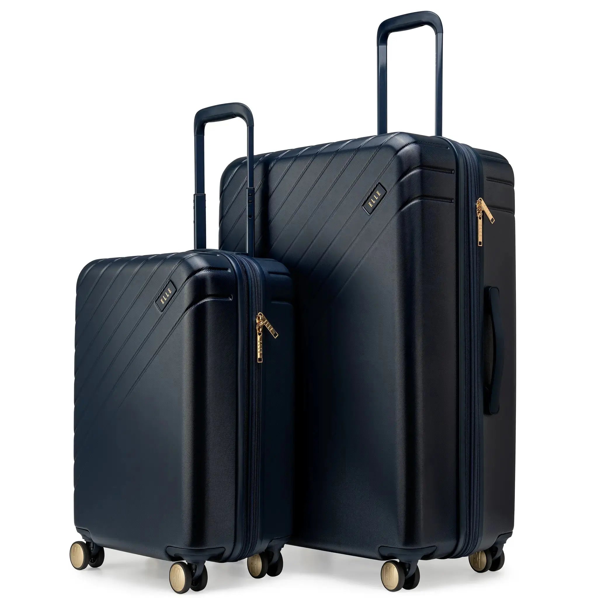 Two navy blue suitcases with gold wheels on a white background