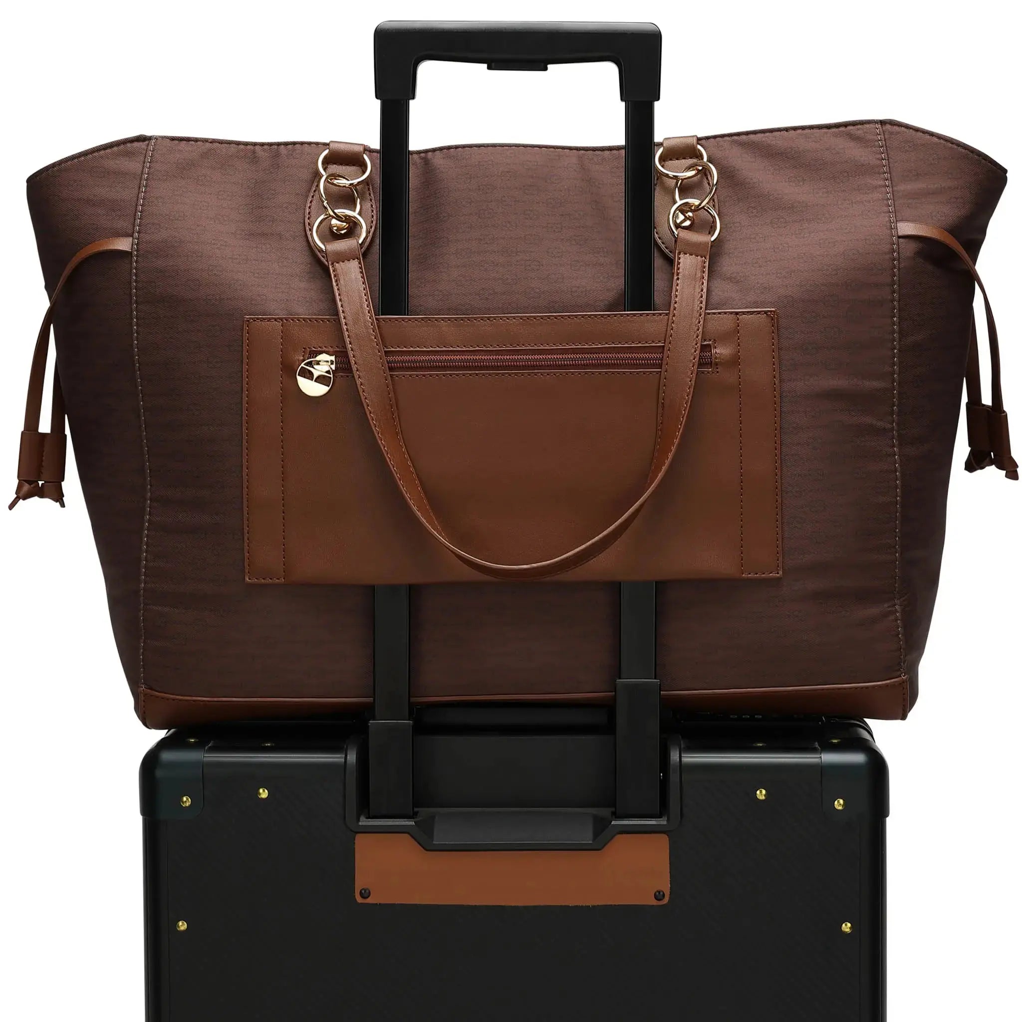 Brown travel bag with handle and wheels on top of a black suitcase.