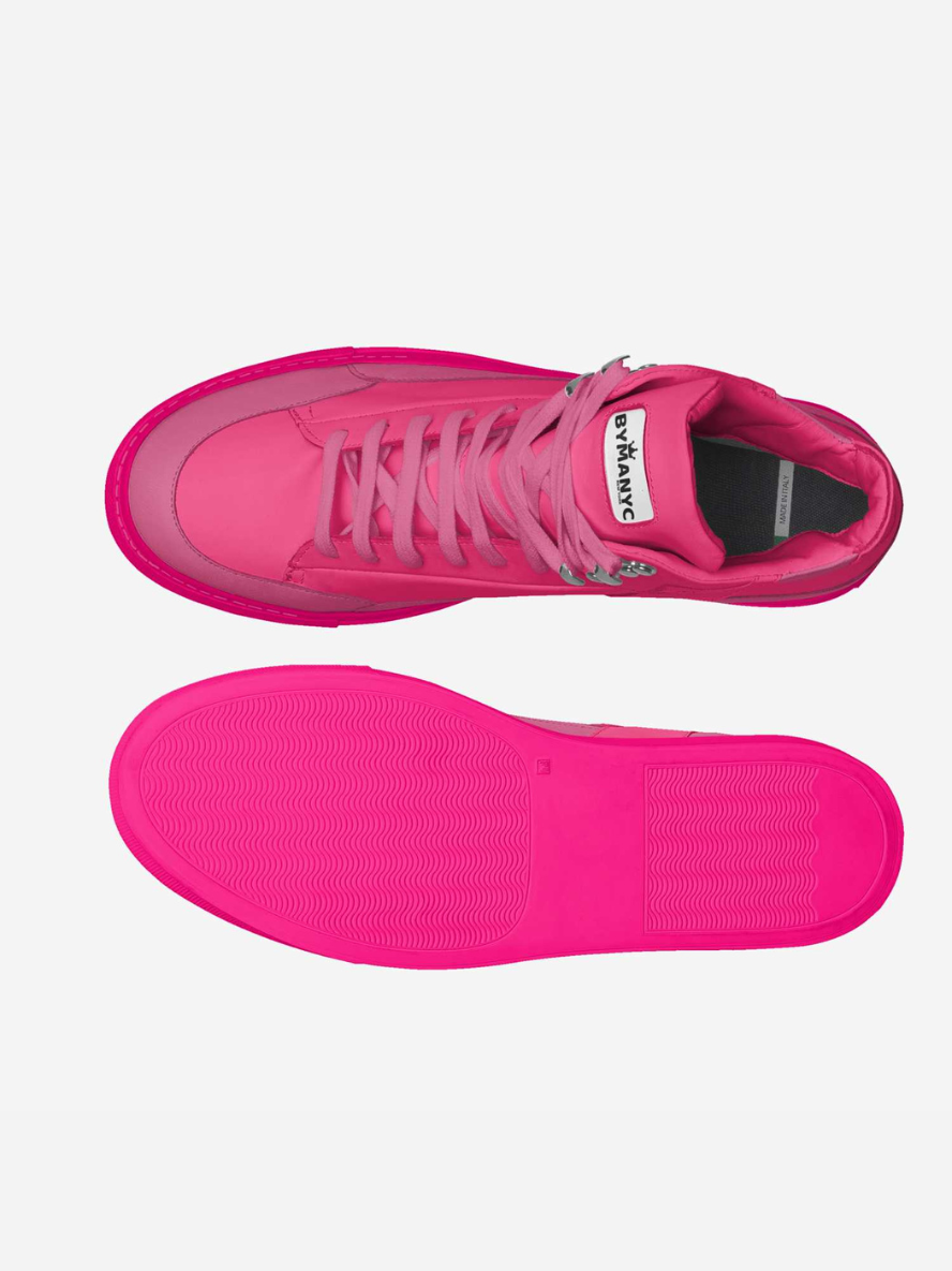 Pink sneakers with a brand logo on a white background