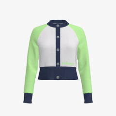 Color-blocked cardigan with green sleeves, white body, and navy accents on a white background