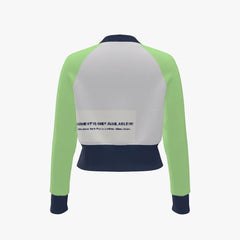 Back view of a jacket with green sleeves and a white patch on a white background