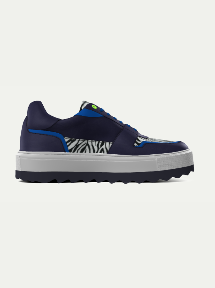 Navy blue sneaker with zebra pattern on a white background