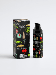 Black bottle and packaging with NYC-themed graphics on a white background