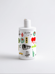 White ceramic vase with New York City-themed illustrations on a white background