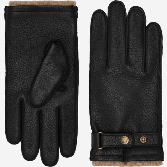 Pair of black leather gloves with a button on a white background