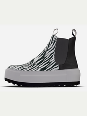 Black and white zebra-patterned sneaker on a white background
