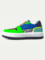Multicolored sneaker with zebra pattern on a white background