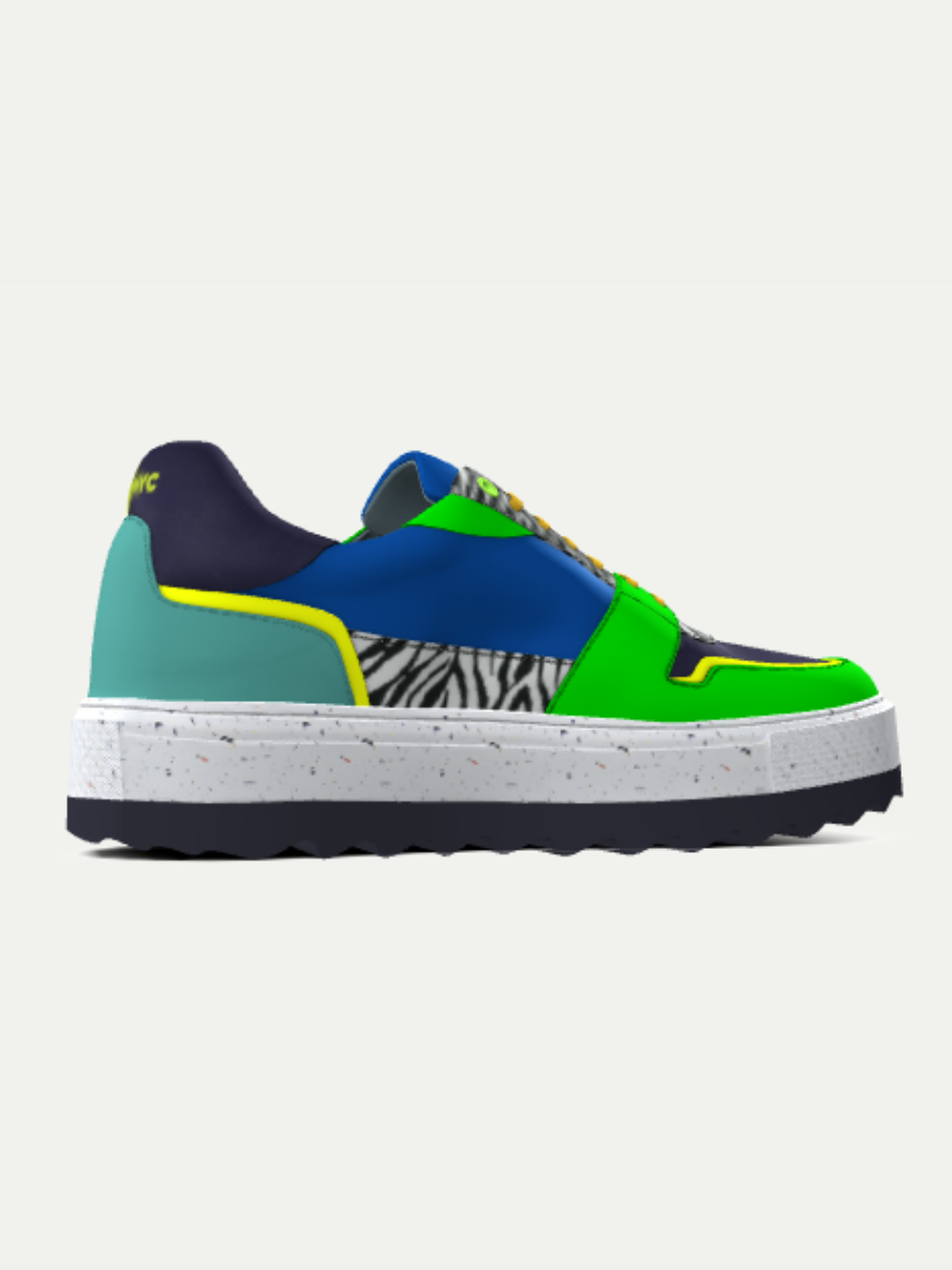 Multicolored sneaker with zebra pattern on a white background