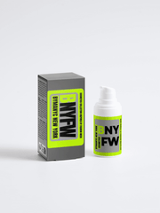 Dynamic New York product packaging with bottle and box on a white background