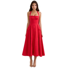Red dress worn by a model on a white background