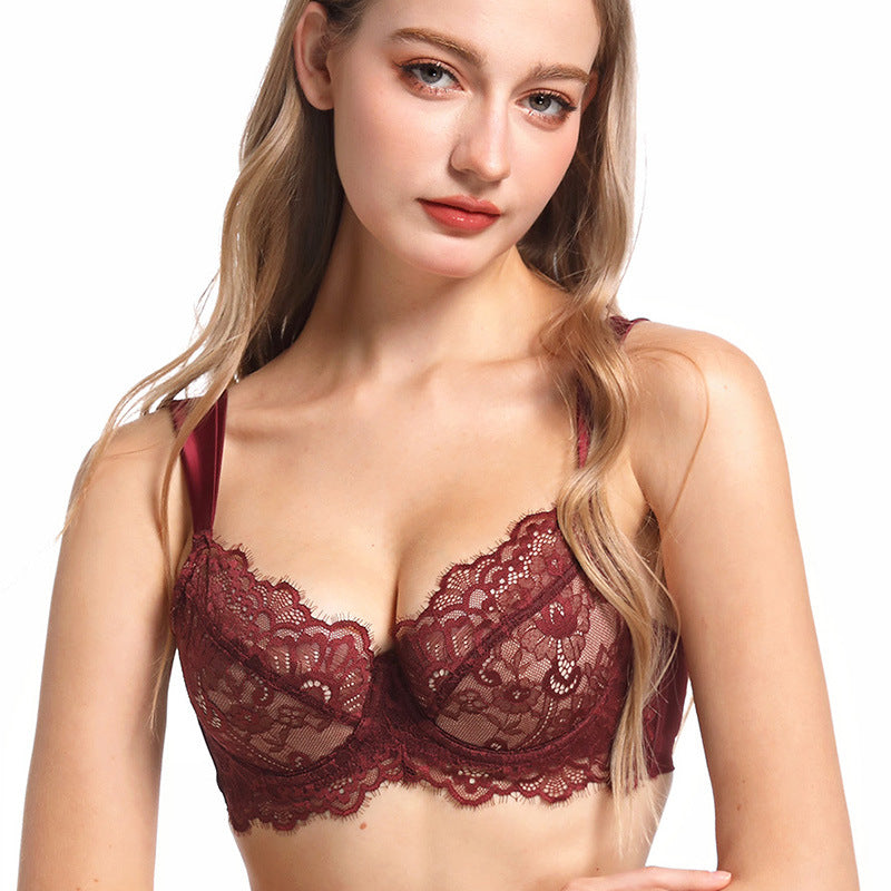 Woman wearing a lace bralette on a white background