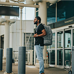 Grey Leather Carry-On Patented Backpack Sole Premise