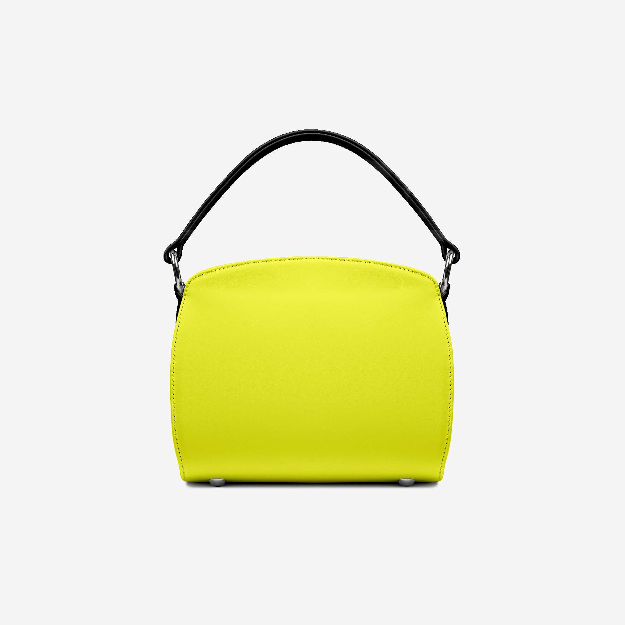 Yellow handbag with a black handle on a light gray background