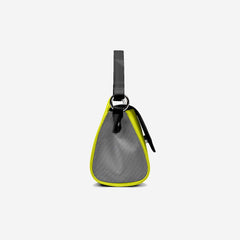Small gray and yellow bag with a black strap on a light gray background