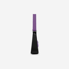 Black device with a purple strap on a white background
