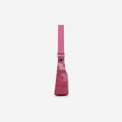 Pink handbag with a strap on a white background