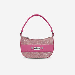Pink handbag with glittery accents and 'Samantha' branding on a light gray background