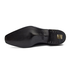 Black shoe sole with brand logo on a white background