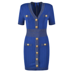 Blue dress with gold buttons on a white background