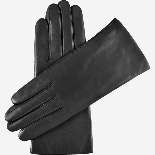 Pair of purple leather gloves on a white background