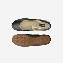 Black sandal with beige insole and sole on a white background