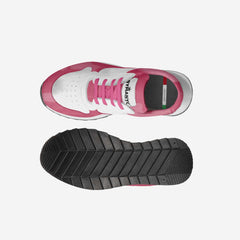 Pink and white sneaker with black sole on a light gray background