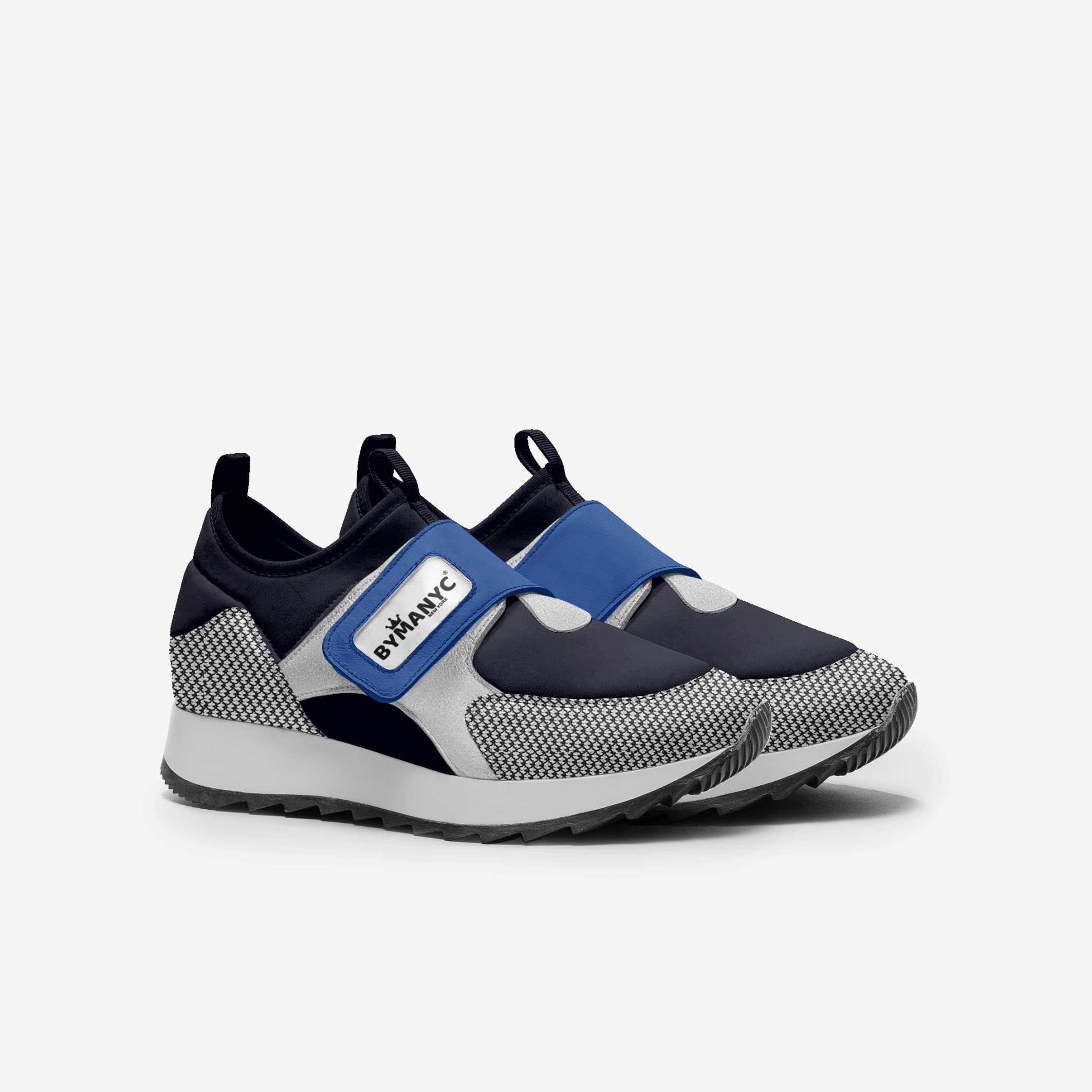 Sneaker with blue strap and black, gray, and white design on a white background