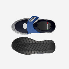 Blue and black slide sandal with textured sole on a light gray background
