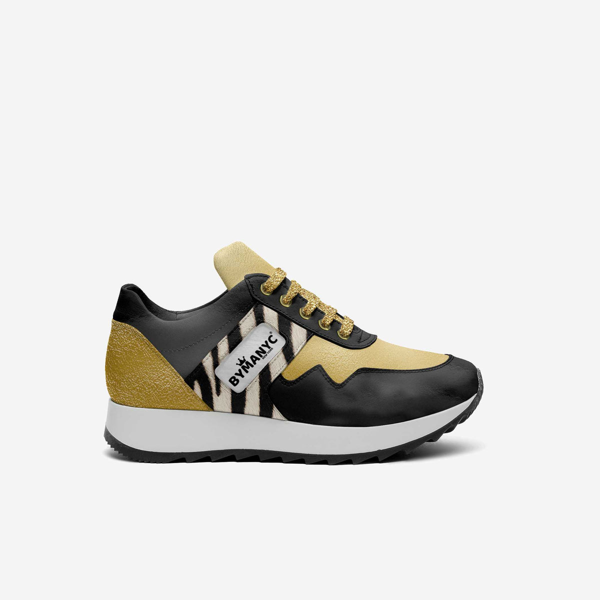 Black and beige sneaker with zebra pattern on a white background