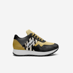 Black and beige sneaker with zebra pattern on a white background