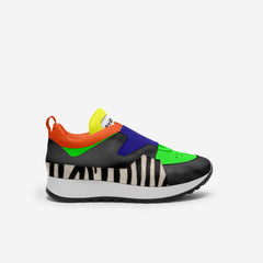Colorful sneaker with zebra pattern sole on a white background