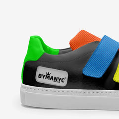 Colorful sneaker with 'BYMANYC' logo on a white background