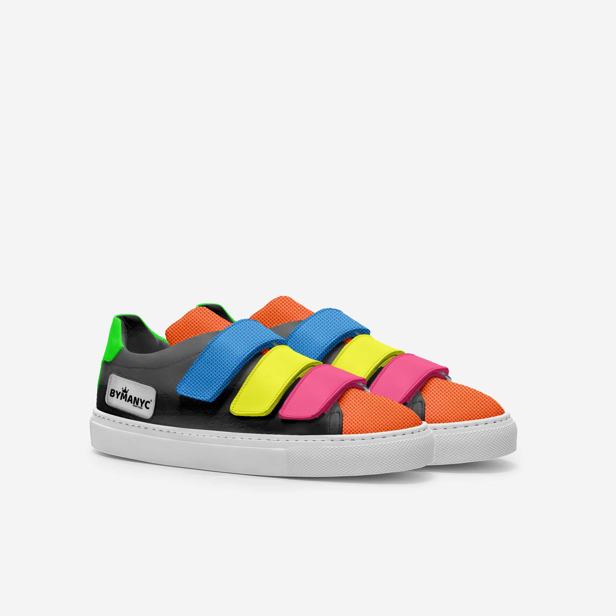 Colorful children's sneakers with multicolor velcro straps on a white background