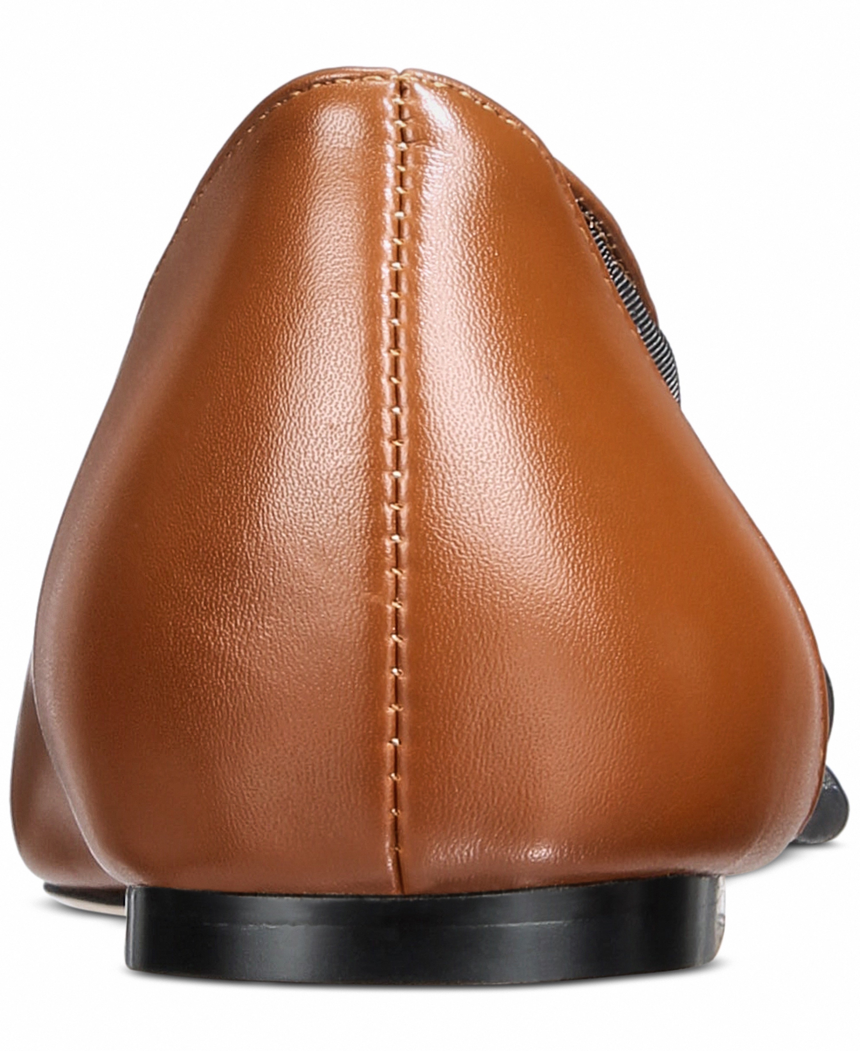 Brown leather shoe with visible stitching on a white background