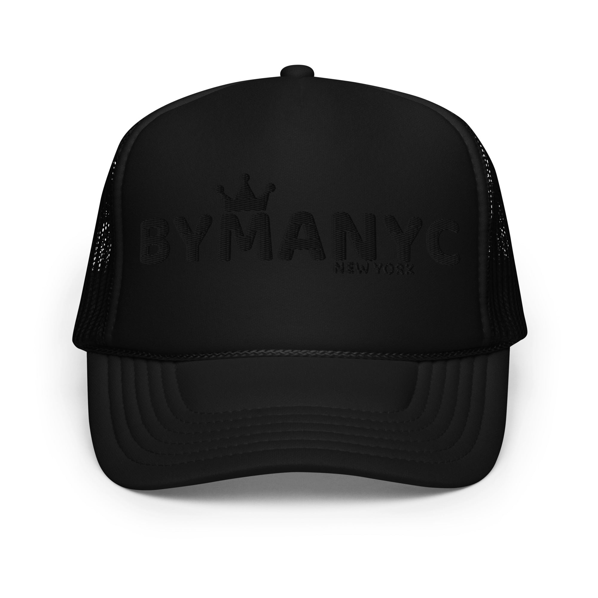 Black trucker cap with 'BY MANN' branding on a white background