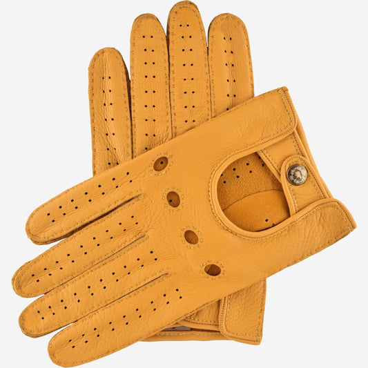 Yellow leather driving glove on a white background