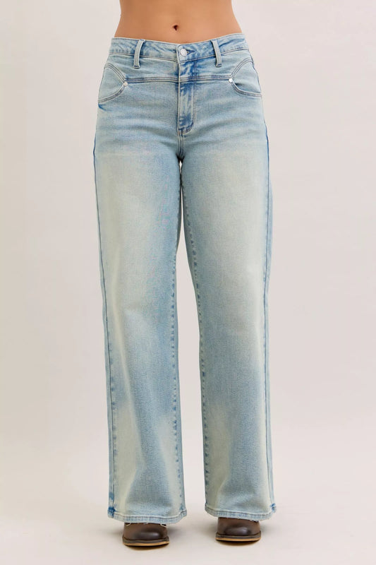 Light blue jeans on a plain background