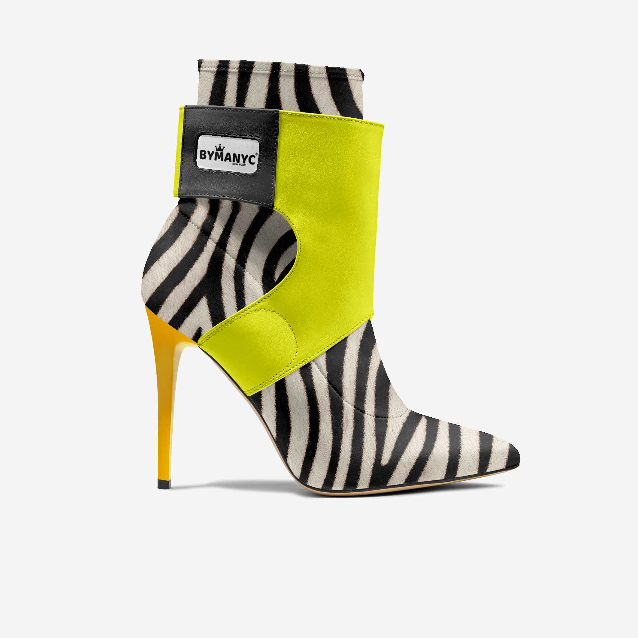Zebra print sock boot with neon yellow accents on a white background
