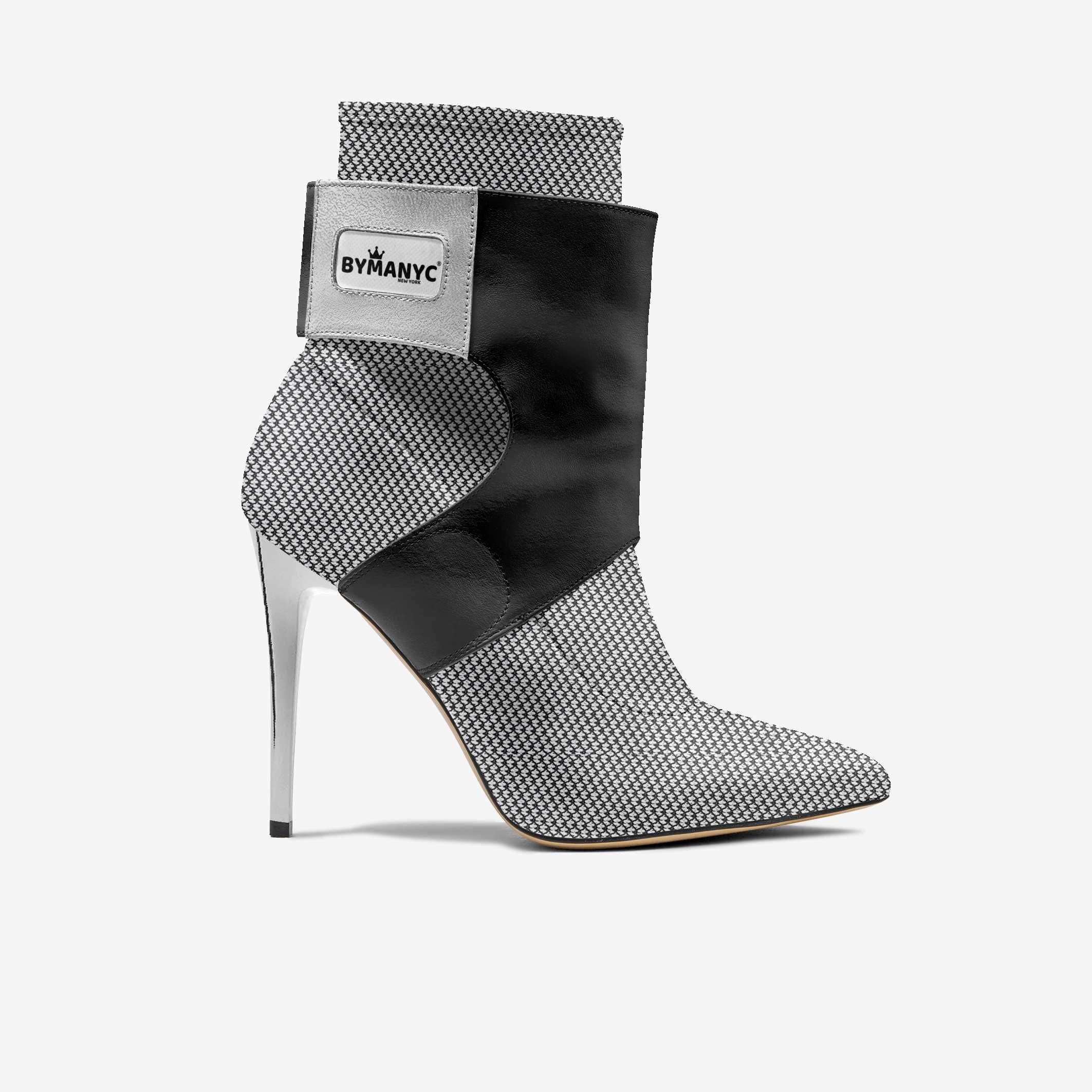 High-heeled ankle boot with patterned design and ByManyc label on a white background