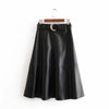 Long faux leather skirt with belt and high waist