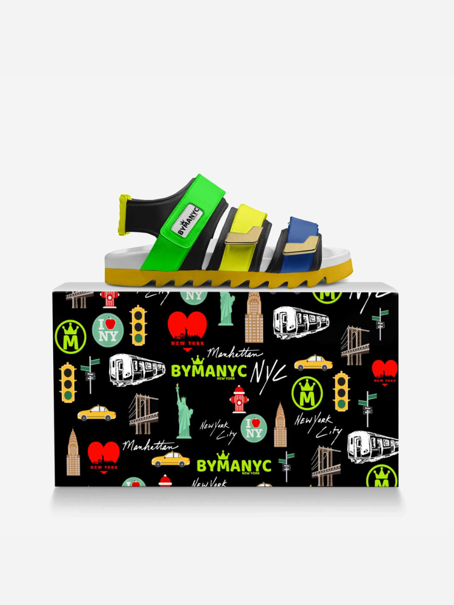 Colorful sandal on a branded box with New York-themed graphics