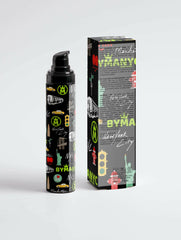 Black cylindrical product with colorful graphics next to its box on a light gray background
