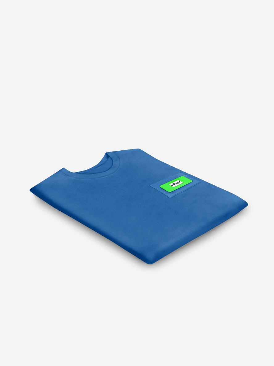 Blue t-shirt with a green label on a white background