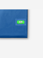 Blue envelope with a green label on a white background
