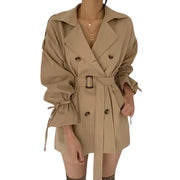 Minimalist women's trench coat with a belt