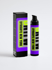 Purple bottle and packaging with 'BYMANYC NEW YORK' branding on a light gray background