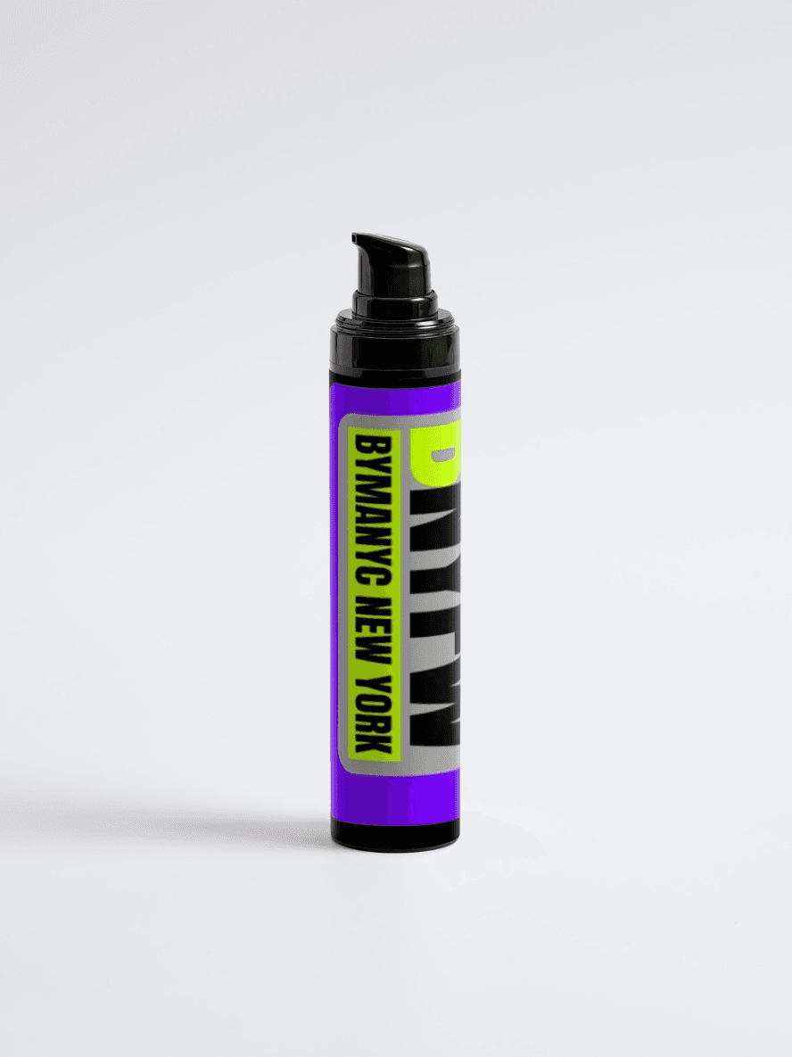 Purple bottle with black and yellow label on a light gray background